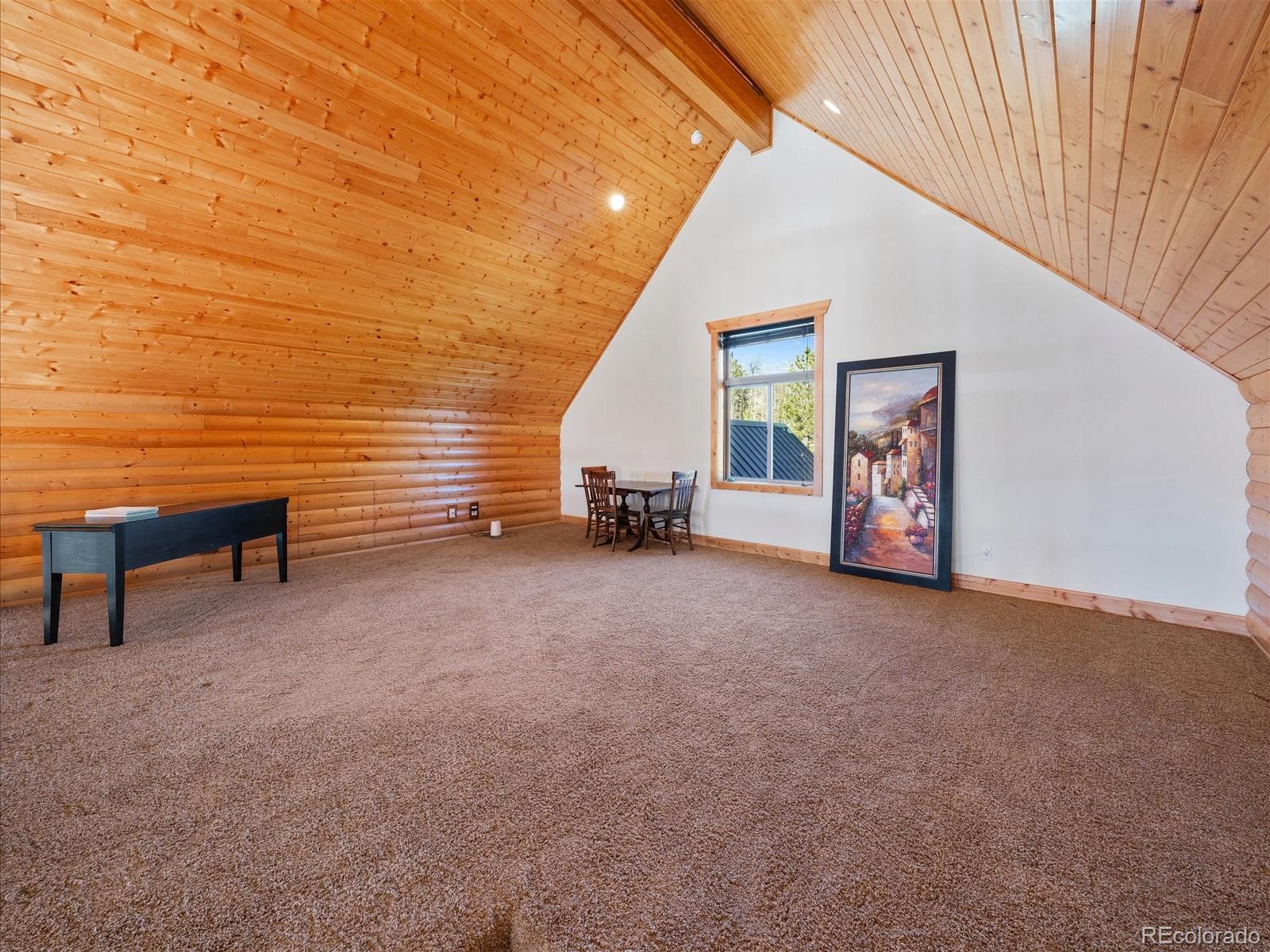 479 Dakota Ridge Road Idaho Springs, CO 80452 - Photo 15 of 50 a view of a livingroom with furniture and a ceiling fan