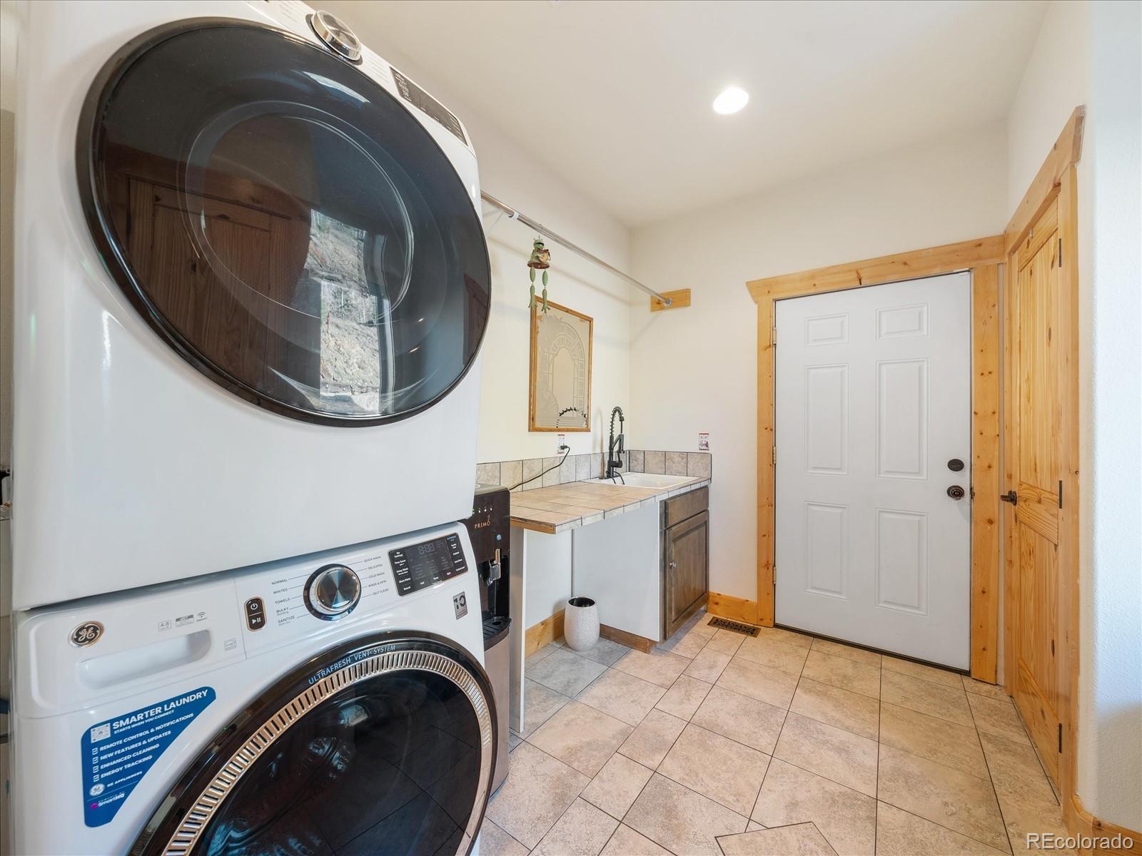 479 Dakota Ridge Road Idaho Springs, CO 80452 - Photo 27 of 50 a view of livingroom with washer and dryer