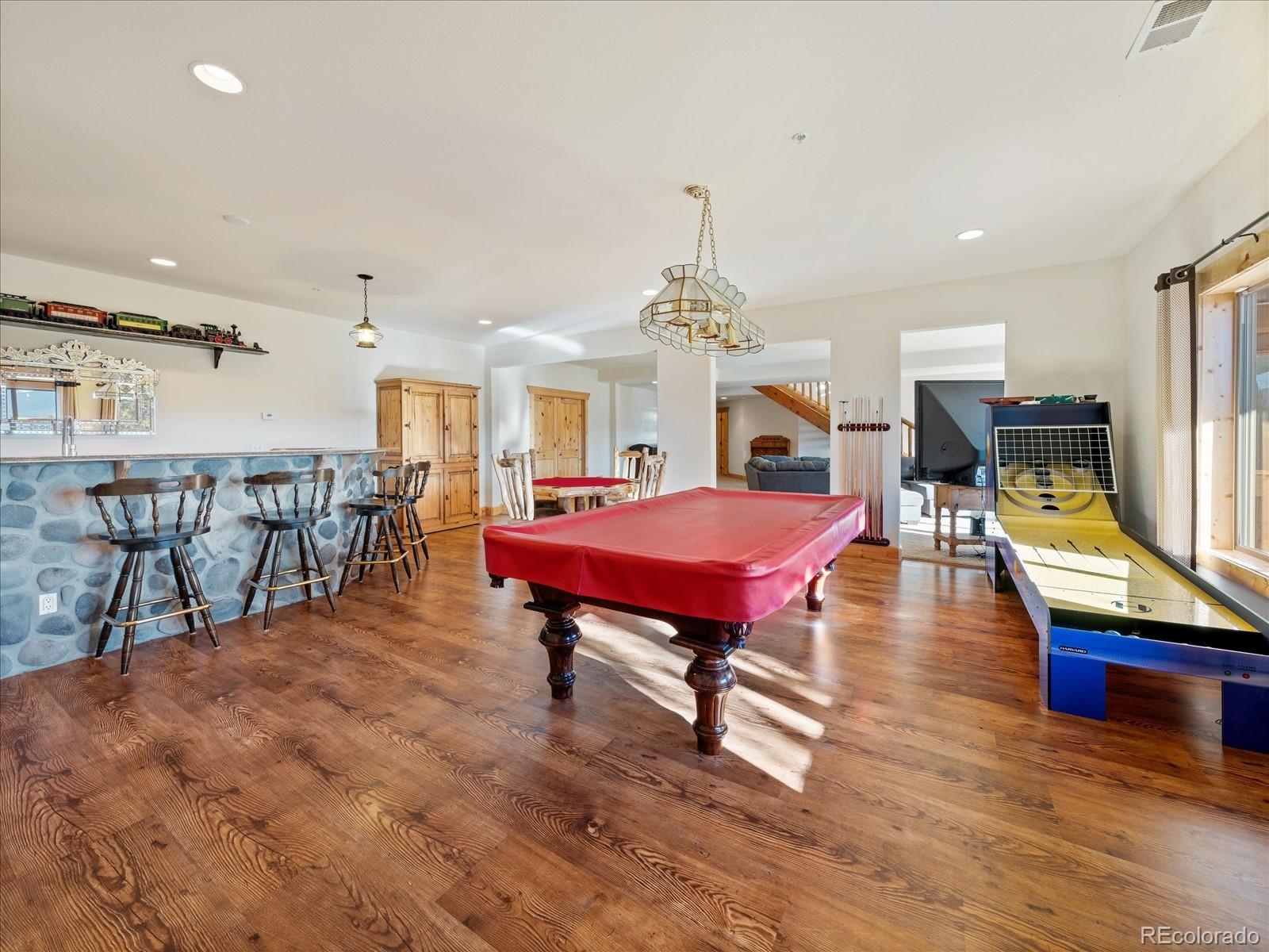 479 Dakota Ridge Road Idaho Springs, CO 80452 - Photo 38 of 50 a living room with furniture and a table