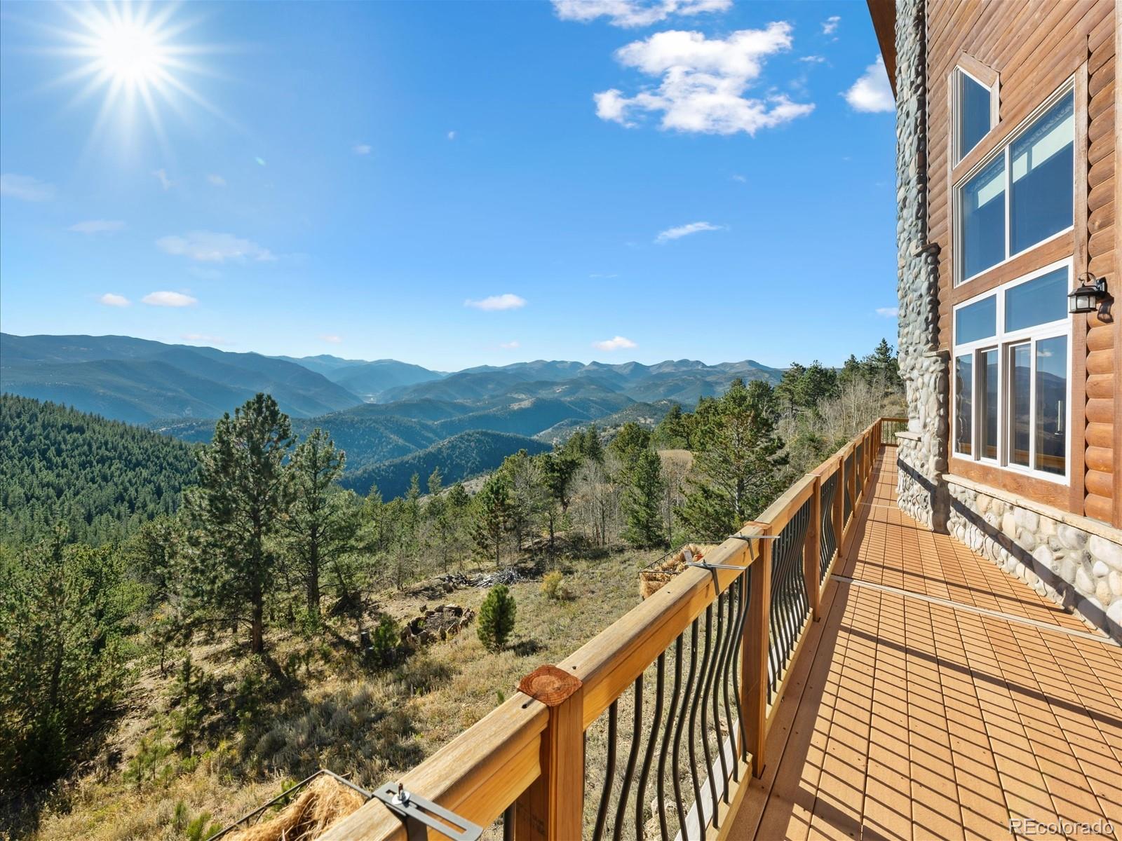 479 Dakota Ridge Road Idaho Springs, CO 80452 - Photo 4 of 50 a view of a city from a balcony