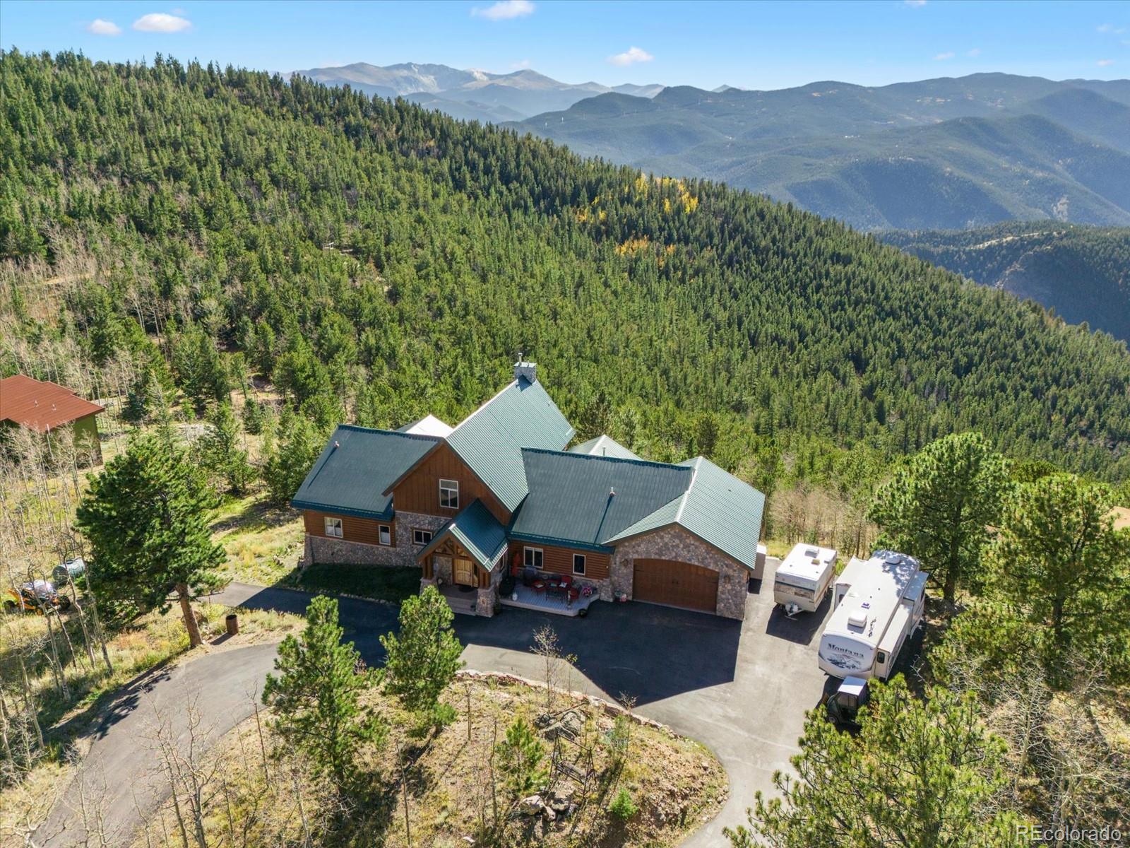 479 Dakota Ridge Road Idaho Springs, CO 80452 - Photo 41 of 50 an aerial view of a house with mountain view