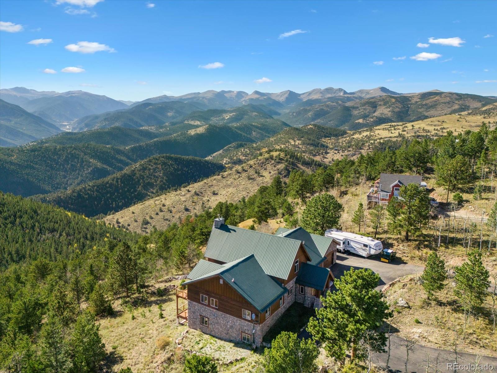 479 Dakota Ridge Road Idaho Springs, CO 80452 - Photo 42 of 50 an aerial view of a house with mountain view