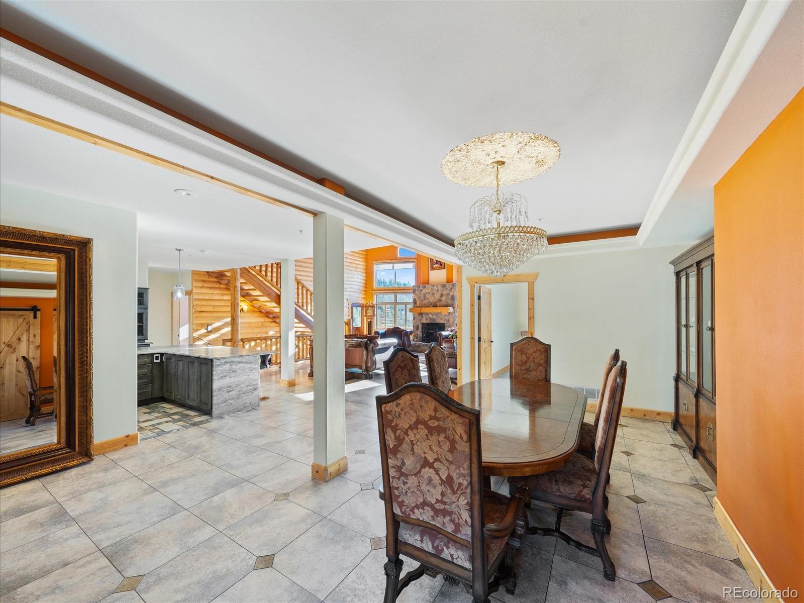 479 Dakota Ridge Road Idaho Springs, CO 80452 - Photo 8 of 50 a view of a dining room with furniture window and outside view