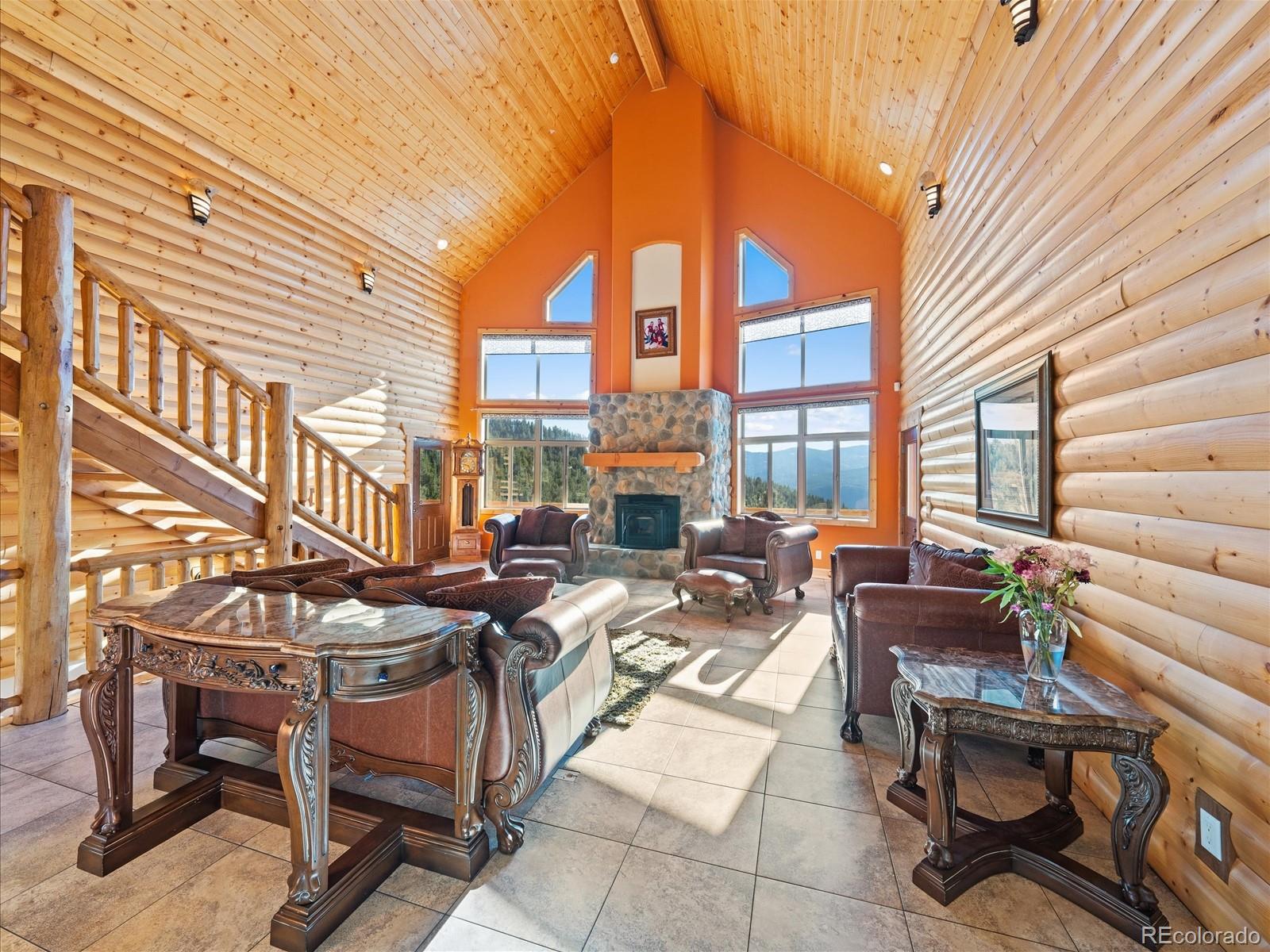 479 Dakota Ridge Road Idaho Springs, CO 80452 - Photo 9 of 50 a view of a patio with chairs and tables