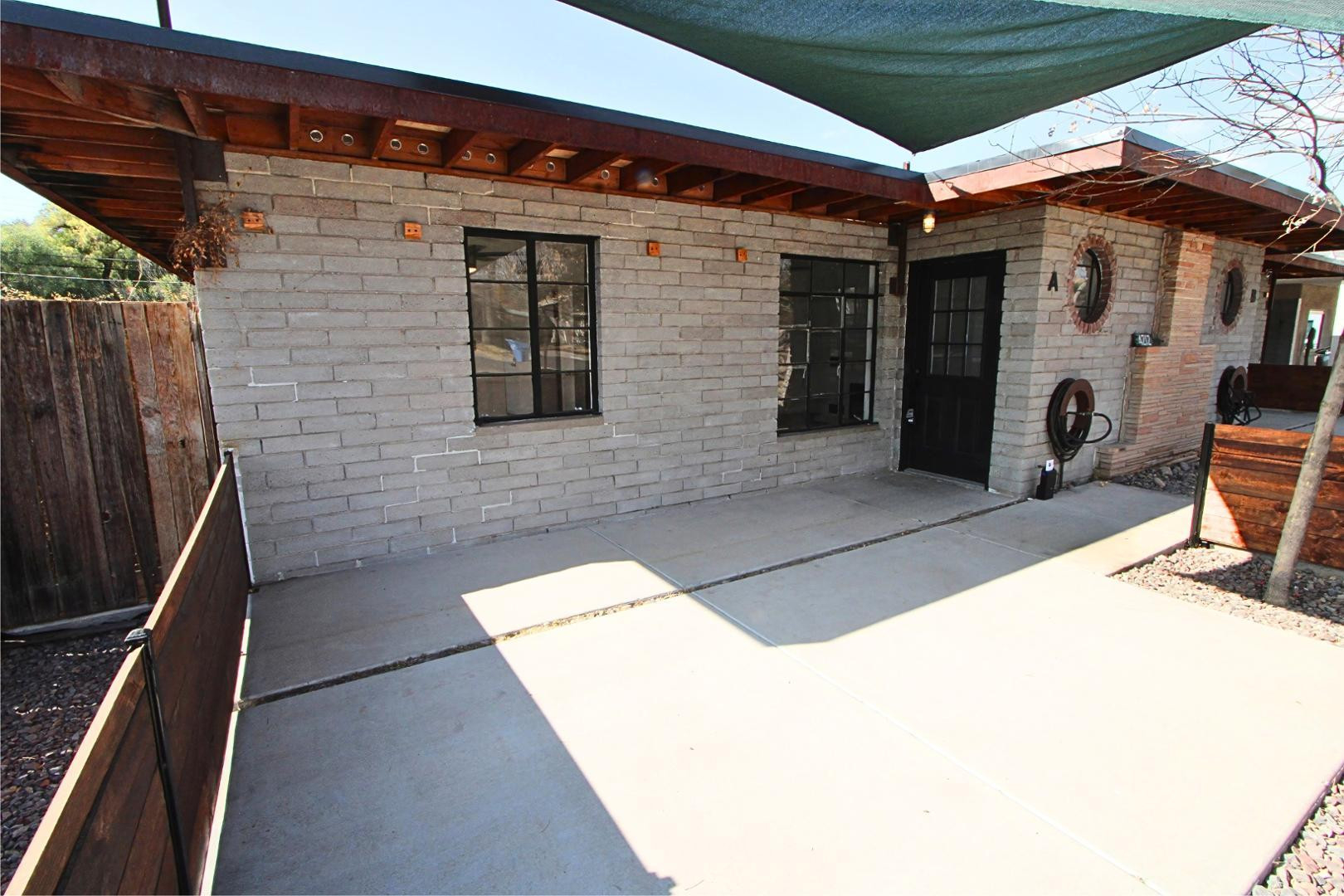 4212 North 19th Street, Unit A Phoenix, AZ 85016 - Photo 1 of 15 a backyard of a house with seating space
