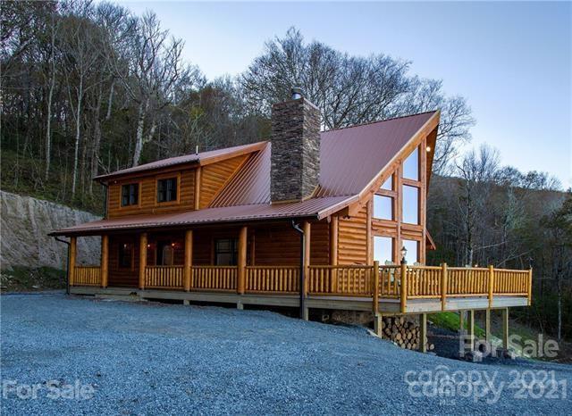147 North Chappell Road, Unit 3 Banner Elk, NC 28604 - Photo 2 of 43 a view of house with a yard