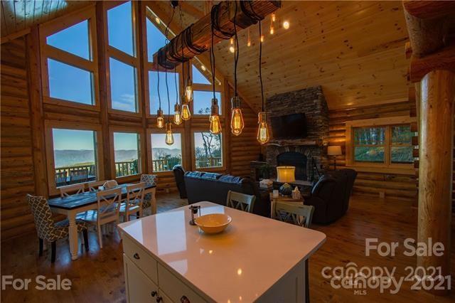 147 North Chappell Road, Unit 3 Banner Elk, NC 28604 - Photo 12 of 43 a kitchen view with table and chairs