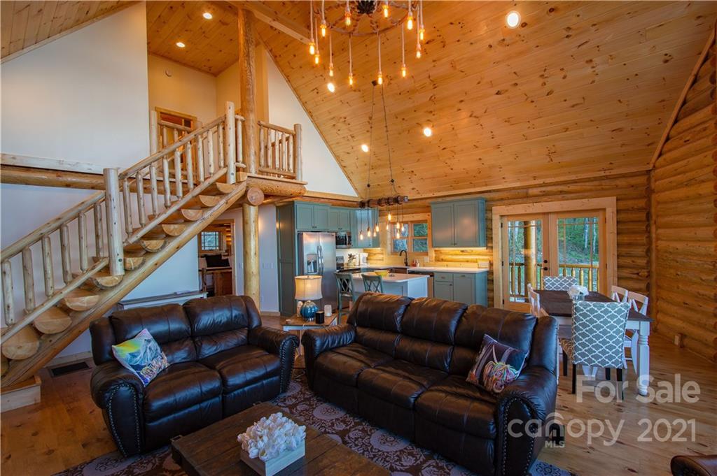 147 North Chappell Road, Unit 3 Banner Elk, NC 28604 - Photo 14 of 43 a living room with furniture and a ceiling fan