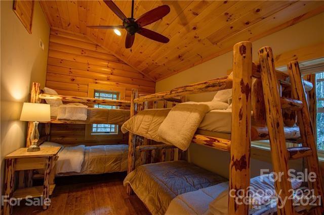 147 North Chappell Road, Unit 3 Banner Elk, NC 28604 - Photo 24 of 43 a view of a chairs and table in a patio