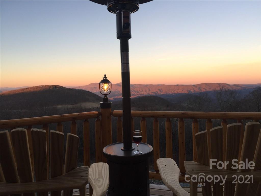 147 North Chappell Road, Unit 3 Banner Elk, NC 28604 - Photo 36 of 43 a balcony with table and chairs