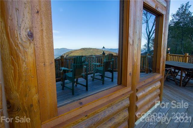 147 North Chappell Road, Unit 3 Banner Elk, NC 28604 - Photo 42 of 43 a view of a balcony with furniture and wooden floor