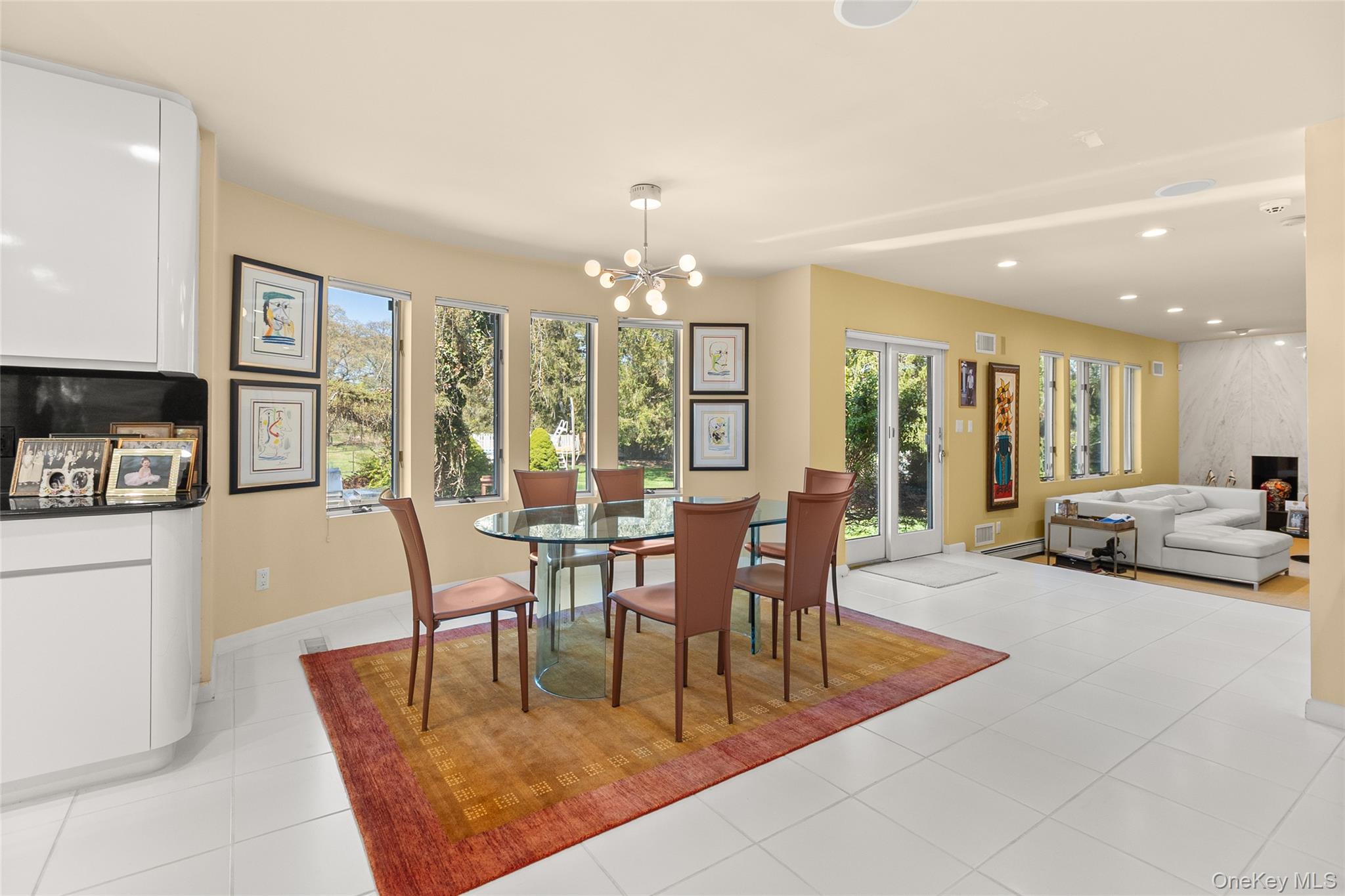 379 Smith Road Ronkonkoma, NY 11779 - Photo 11 of 38 a view of a dining room with furniture window and outside view