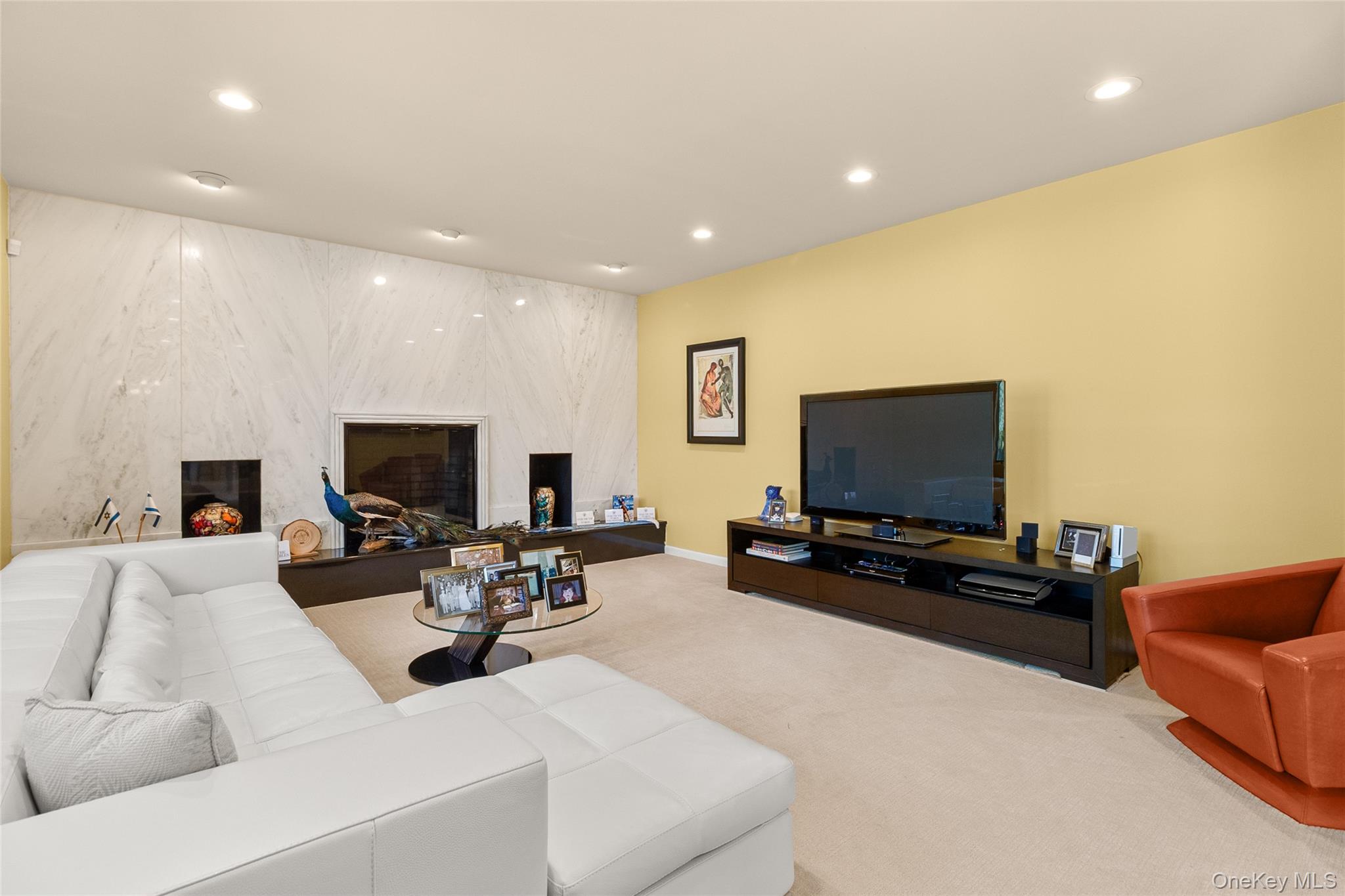 379 Smith Road Ronkonkoma, NY 11779 - Photo 13 of 38 a living room with furniture and a flat screen tv