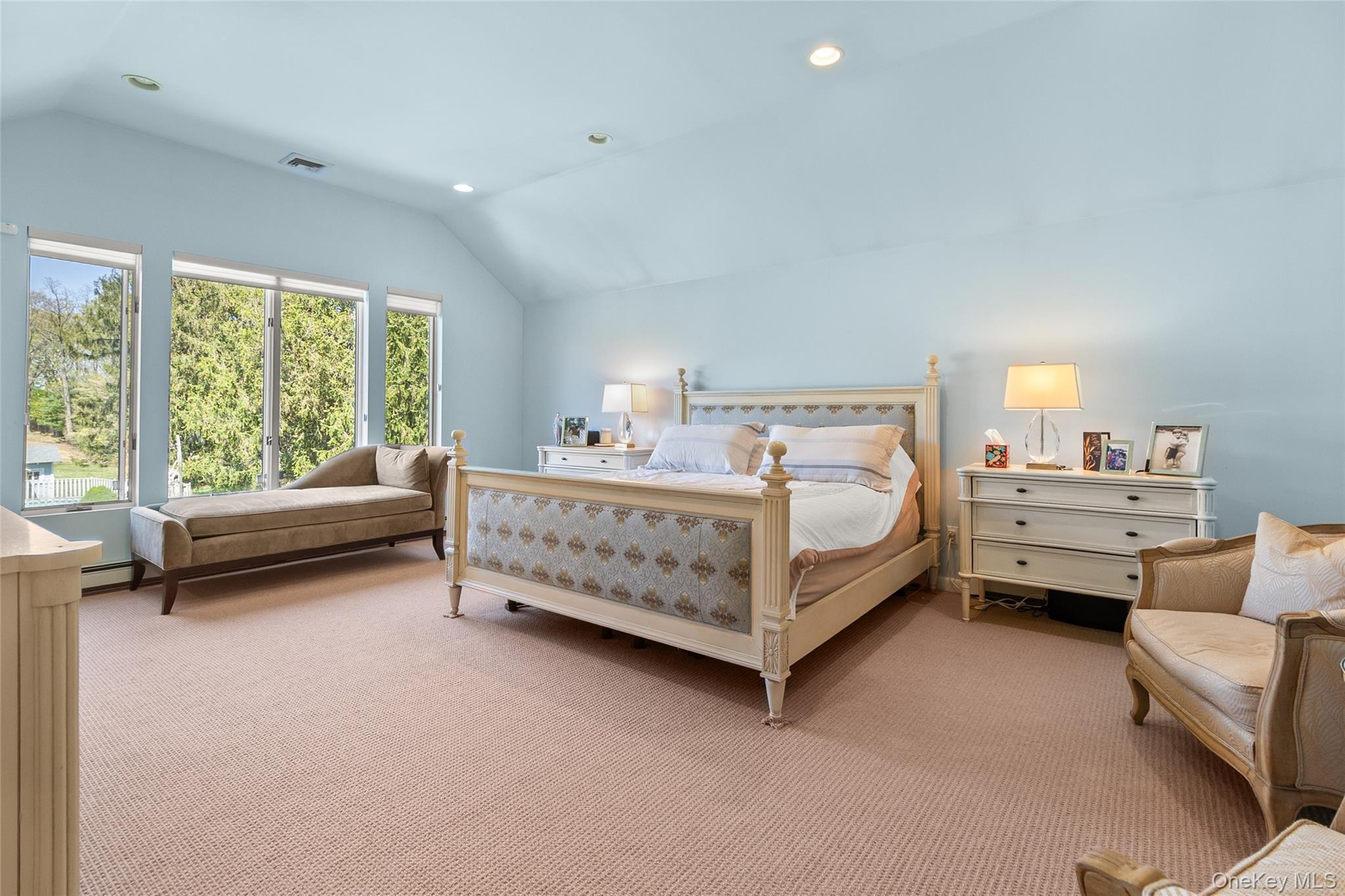 379 Smith Road Ronkonkoma, NY 11779 - Photo 19 of 38 a bedroom with a bed chair and window
