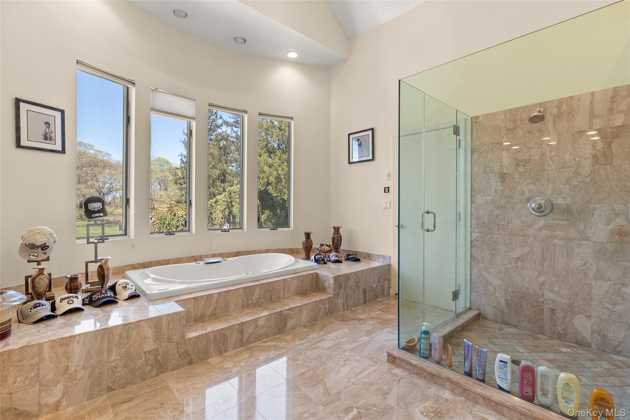 379 Smith Road Ronkonkoma, NY 11779 - Photo 22 of 38 a spacious bathroom with a tub sink and mirror