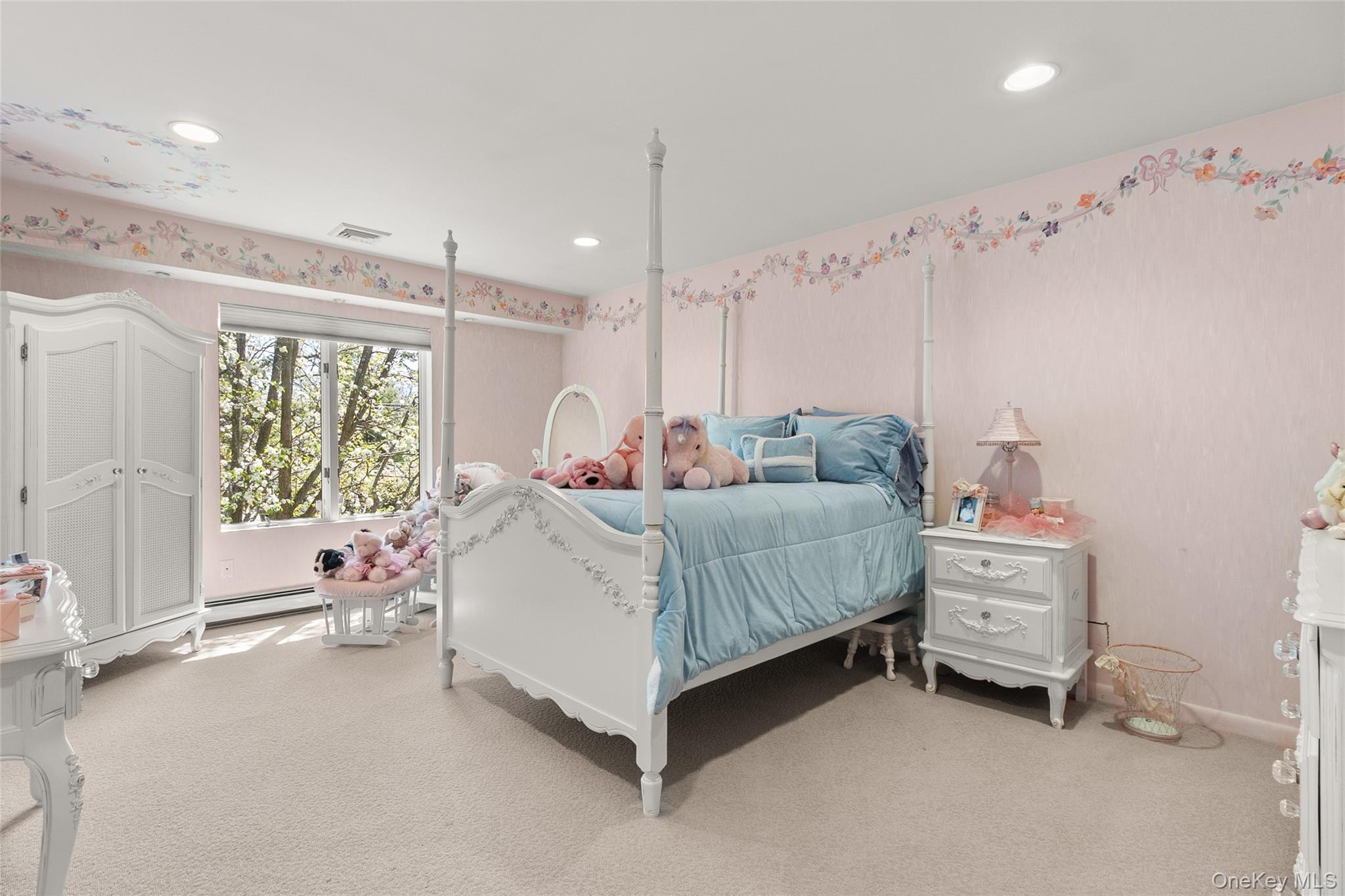 379 Smith Road Ronkonkoma, NY 11779 - Photo 23 of 38 a bedroom with a bed and a window