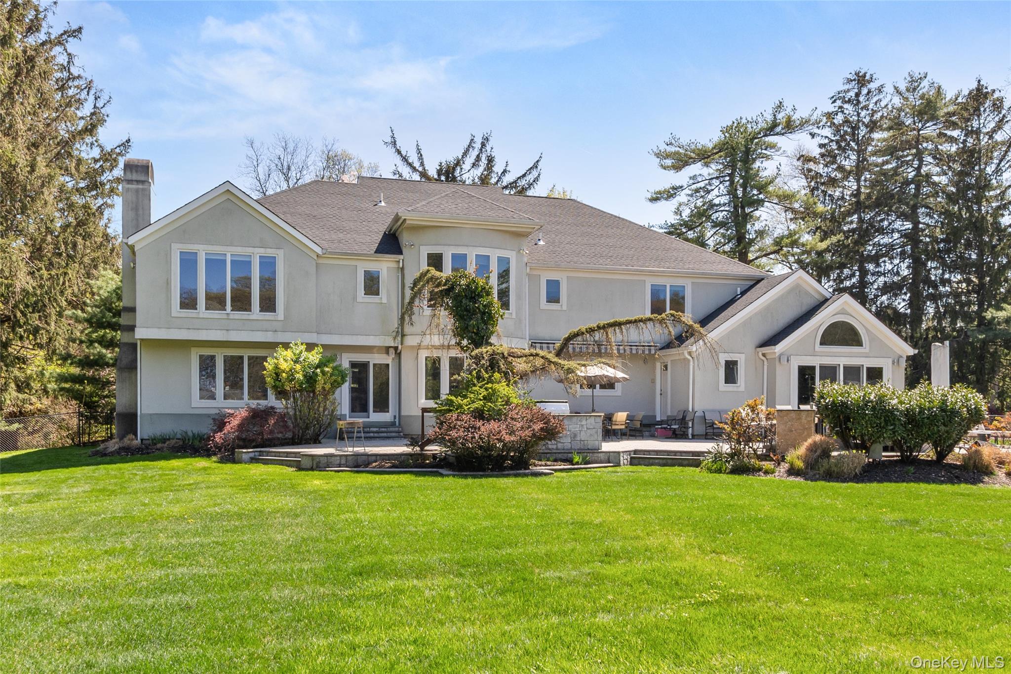 379 Smith Road Ronkonkoma, NY 11779 - Photo 27 of 38 a front view of house with yard and green space