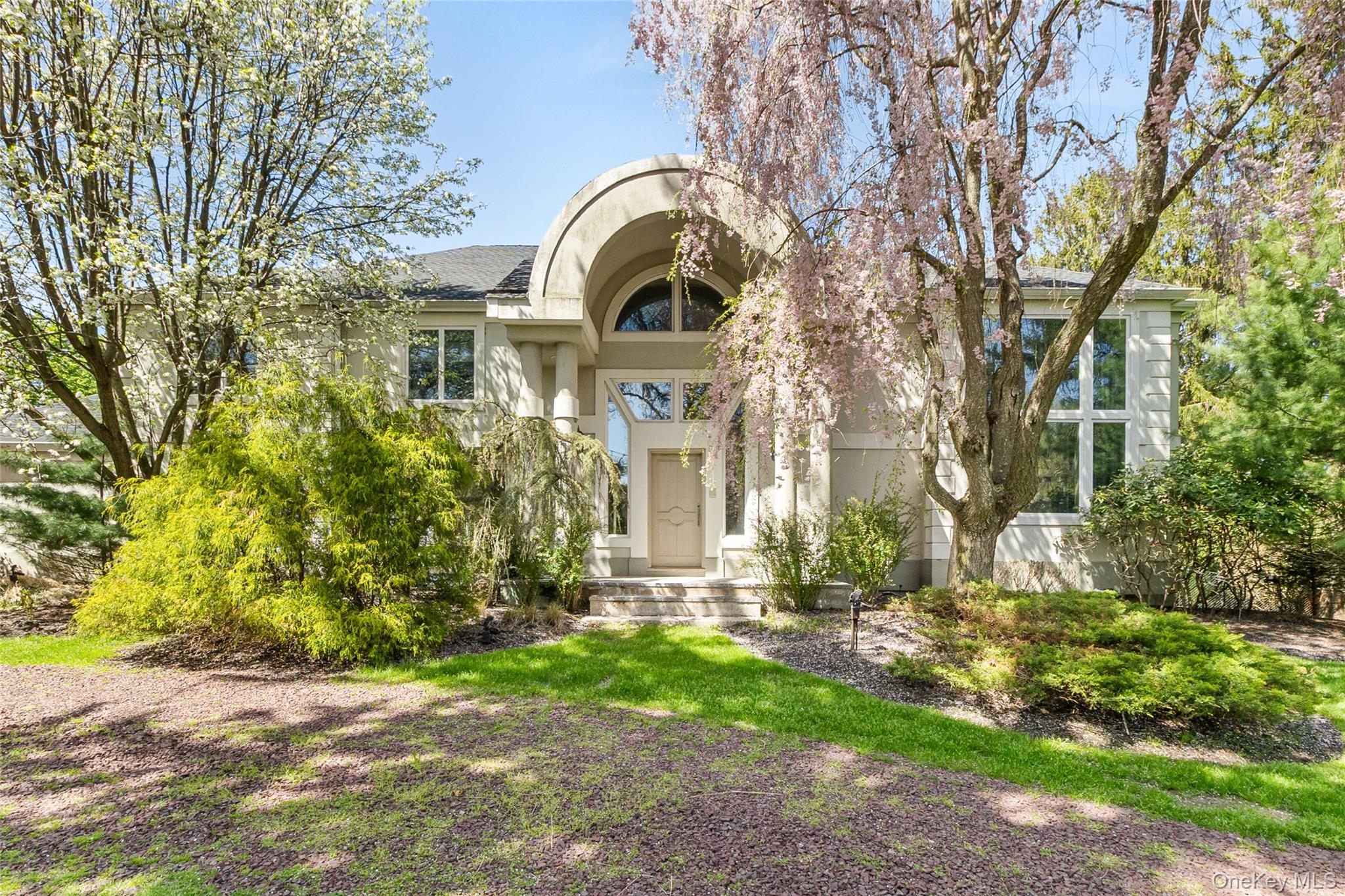 379 Smith Road Ronkonkoma, NY 11779 - Photo 3 of 38 a front view of a house with garden