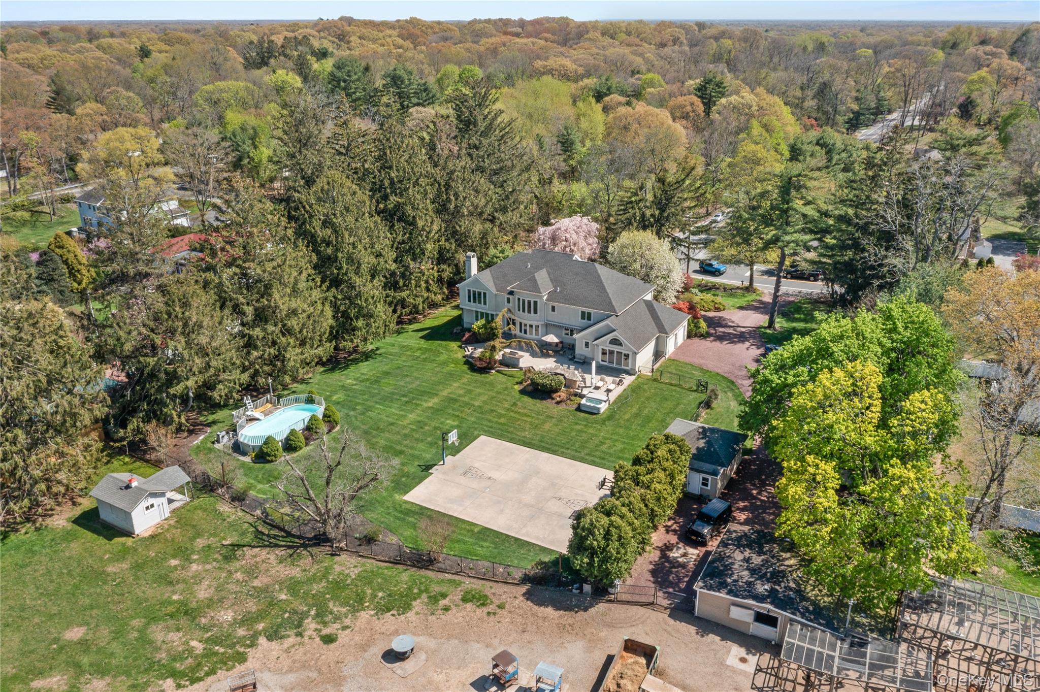 379 Smith Road Ronkonkoma, NY 11779 - Photo 31 of 38 an aerial view of a house with a yard