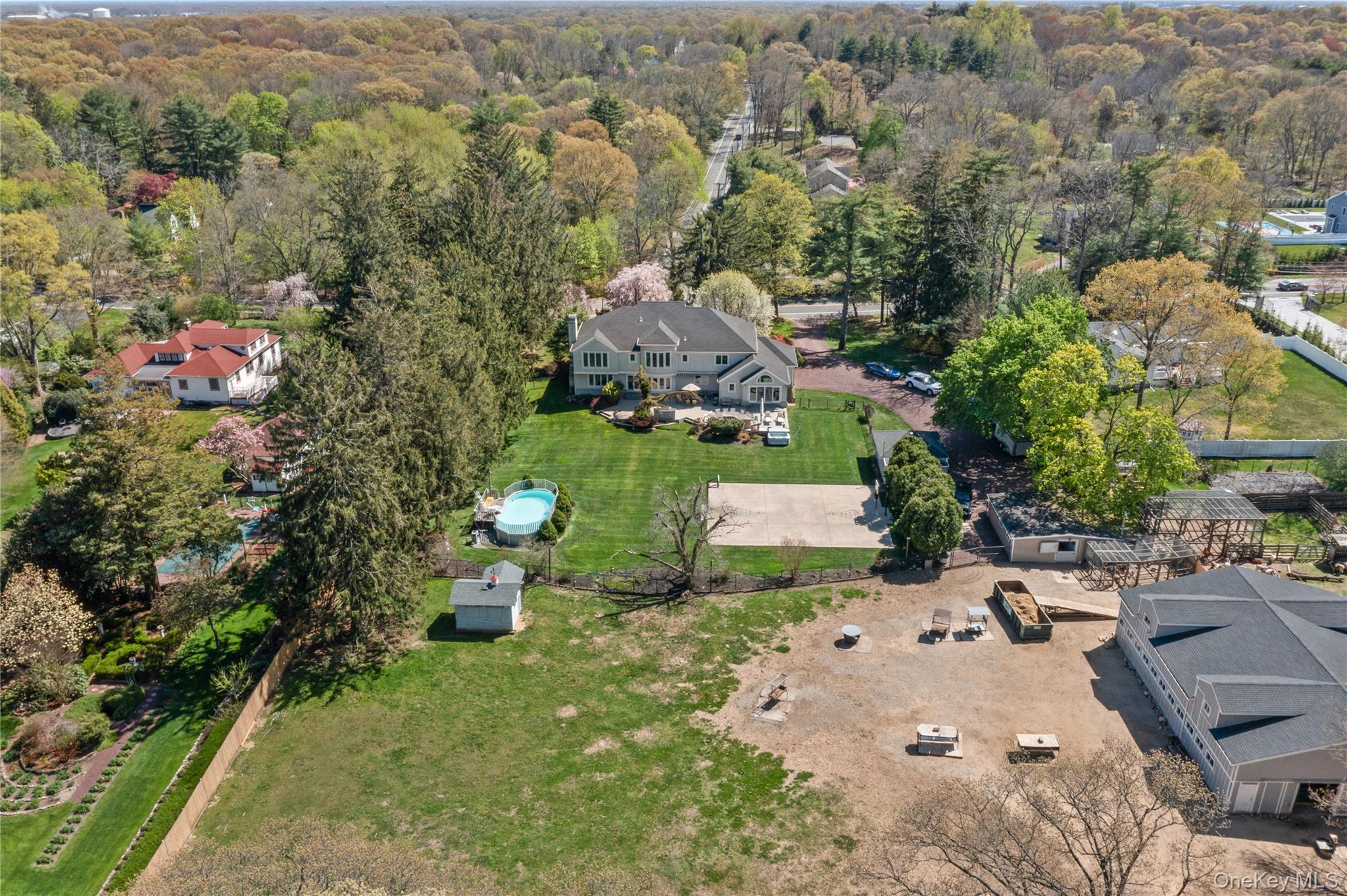 379 Smith Road Ronkonkoma, NY 11779 - Photo 33 of 38 an aerial view of a house with a yard