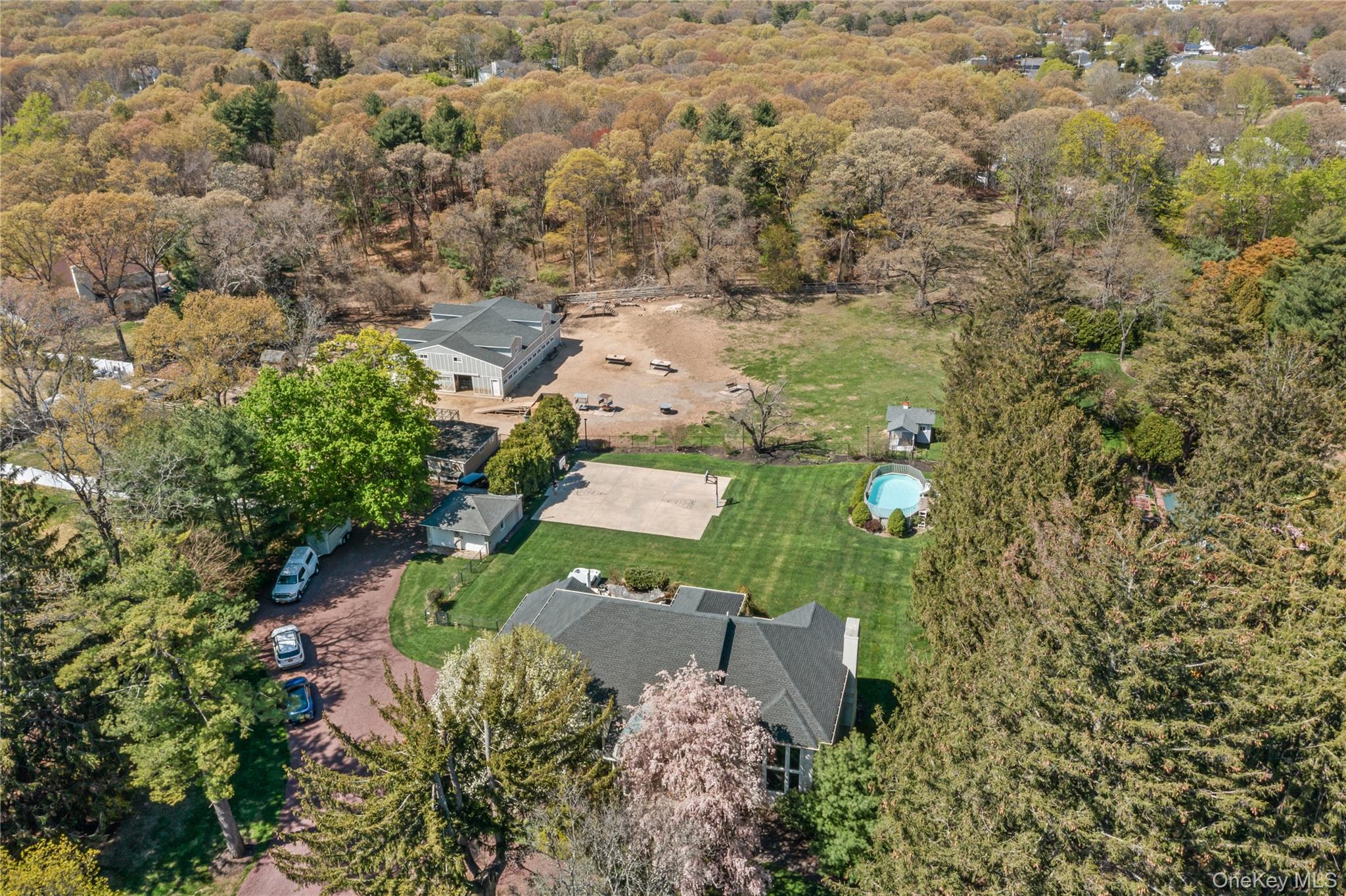 379 Smith Road Ronkonkoma, NY 11779 - Photo 34 of 38 an aerial view of a house with a yard