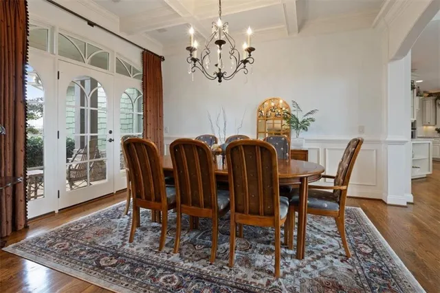 a large kitchen with granite countertop a lot of counter space and a sink