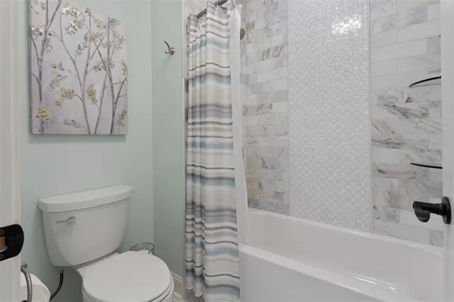 a view of a swimming pool with a yard and mountain view