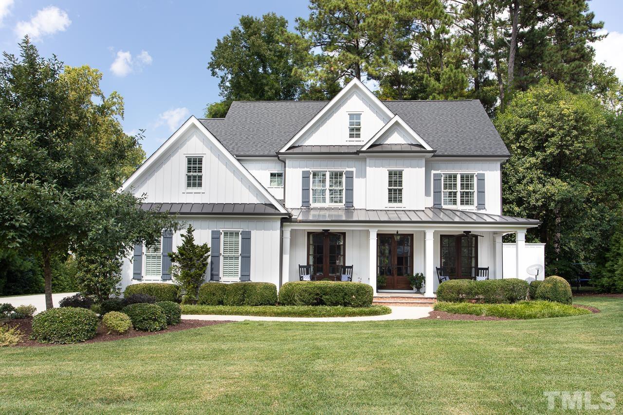 902 Shelley Road Raleigh, NC 27609 - Photo 1 of 45 a front view of a house with a yard