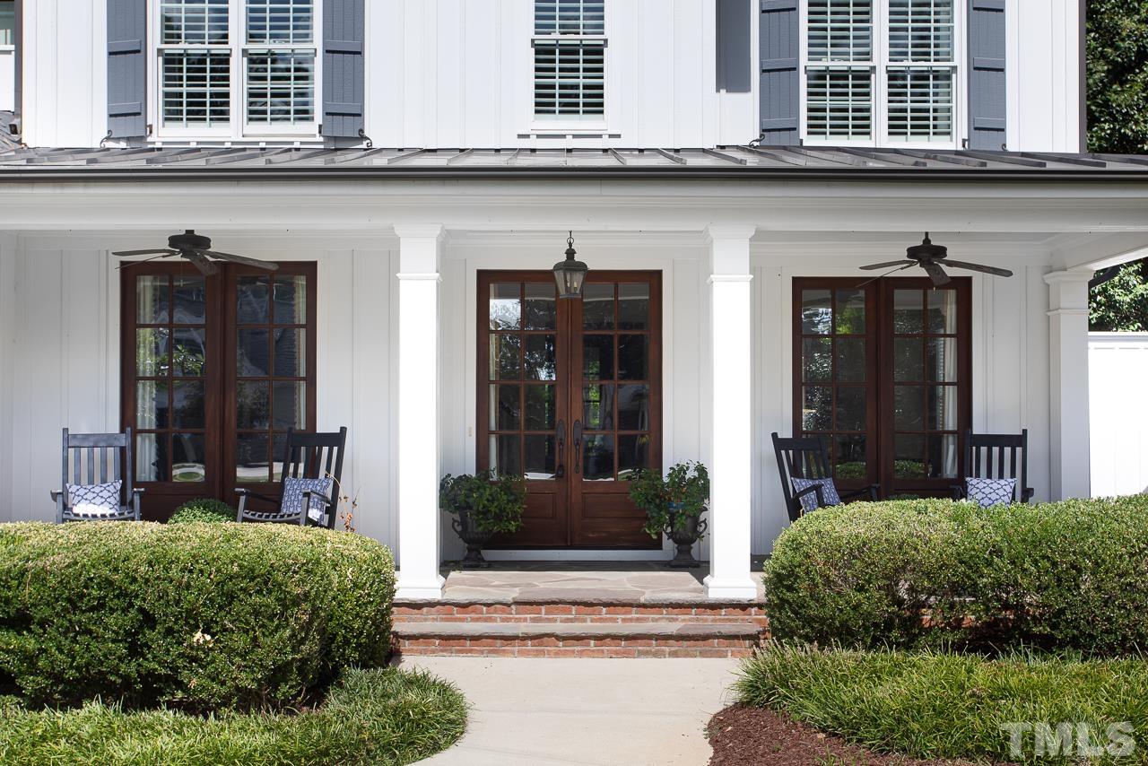 902 Shelley Road Raleigh, NC 27609 - Photo 2 of 45 front view of a building with a lots of windows