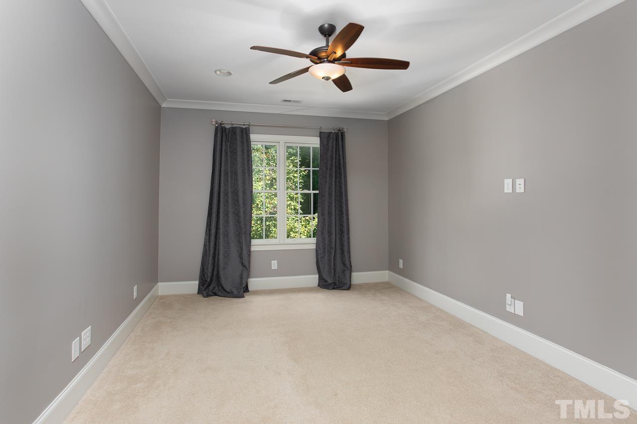 902 Shelley Road Raleigh, NC 27609 - Photo 34 of 45 a view of an empty room with a window