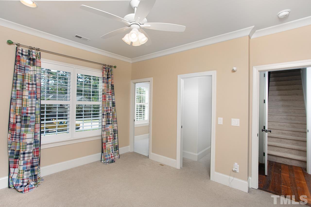 902 Shelley Road Raleigh, NC 27609 - Photo 36 of 45 a view of an empty room with a window