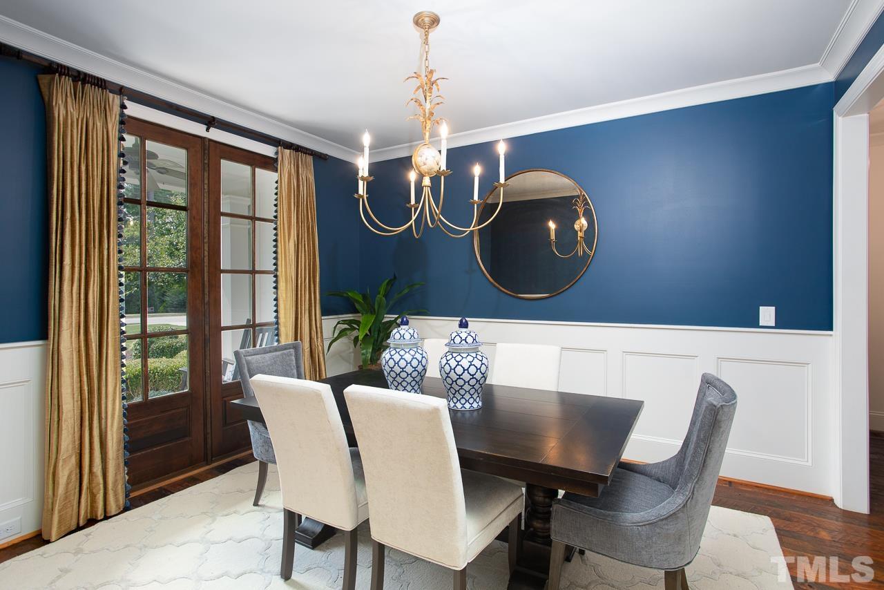 902 Shelley Road Raleigh, NC 27609 - Photo 4 of 45 a view of a dining room with furniture window and outside view