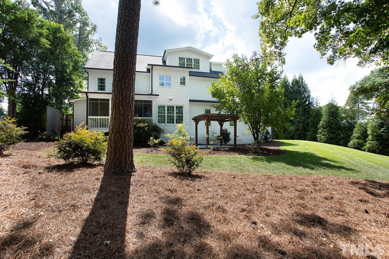 902 Shelley Road Raleigh, NC 27609 - Photo 43 of 45 a view of a house with a yard and tree s
