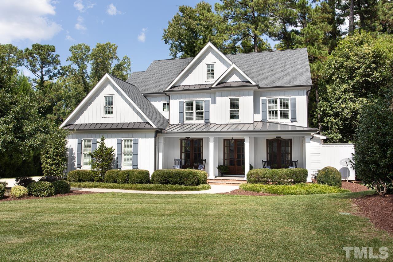902 Shelley Road Raleigh, NC 27609 - Photo 45 of 45 a front view of a house with a garden