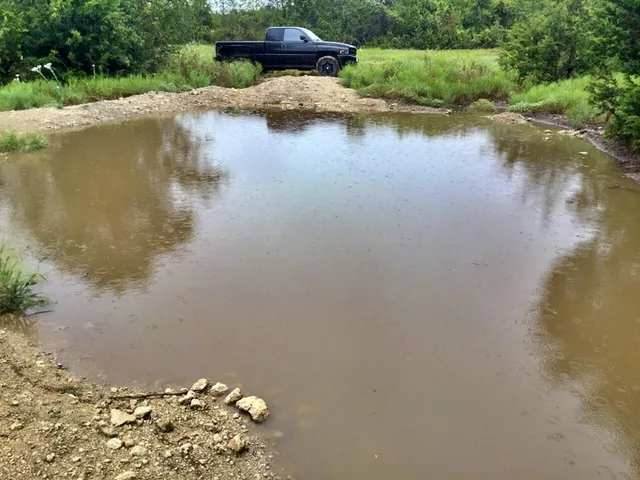 a view of a lake with a mountain