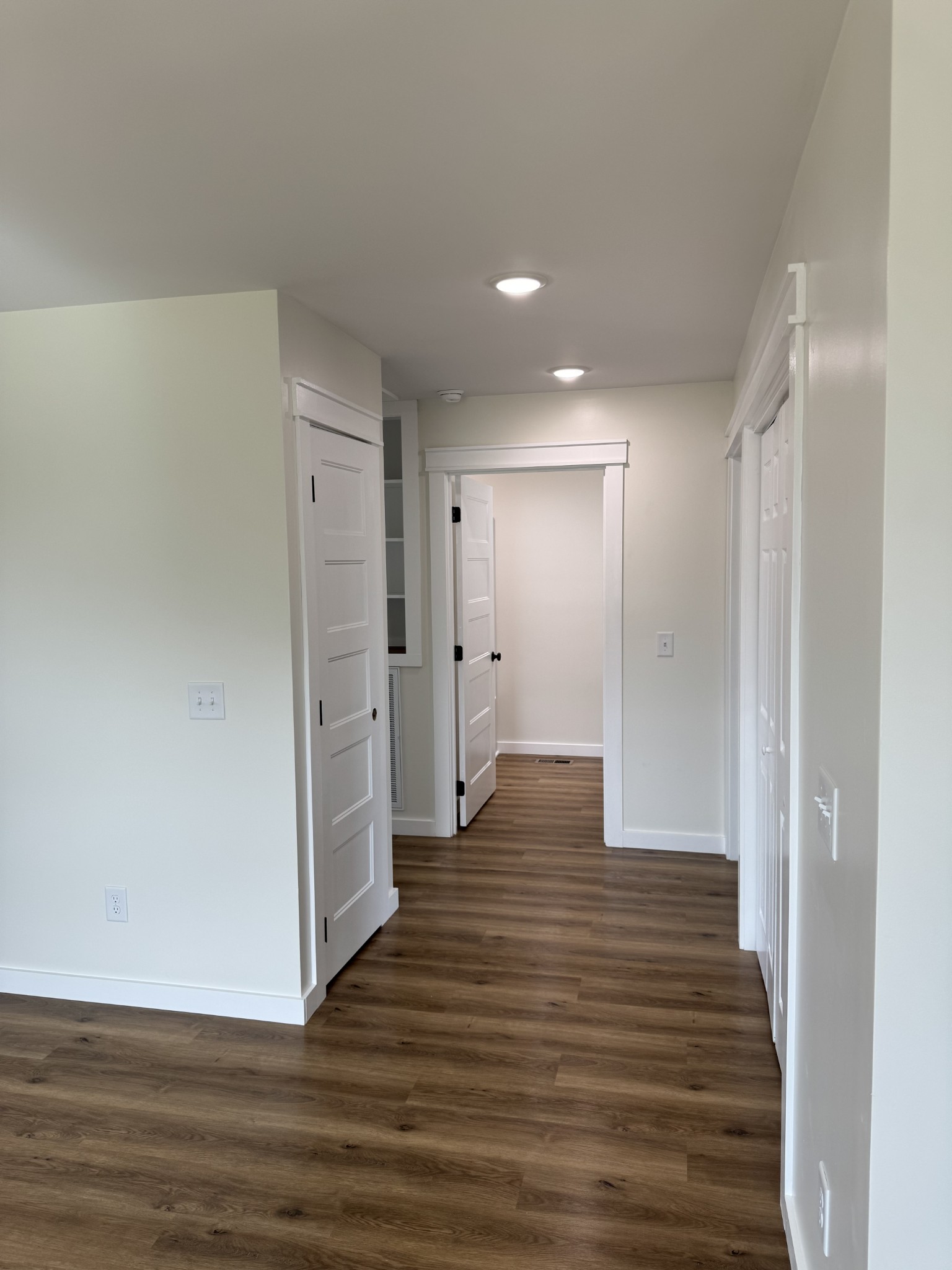 706 Courthouse View Street Lafayette, TN 37083 - Photo 12 of 27 a view of a hallway with wooden floor