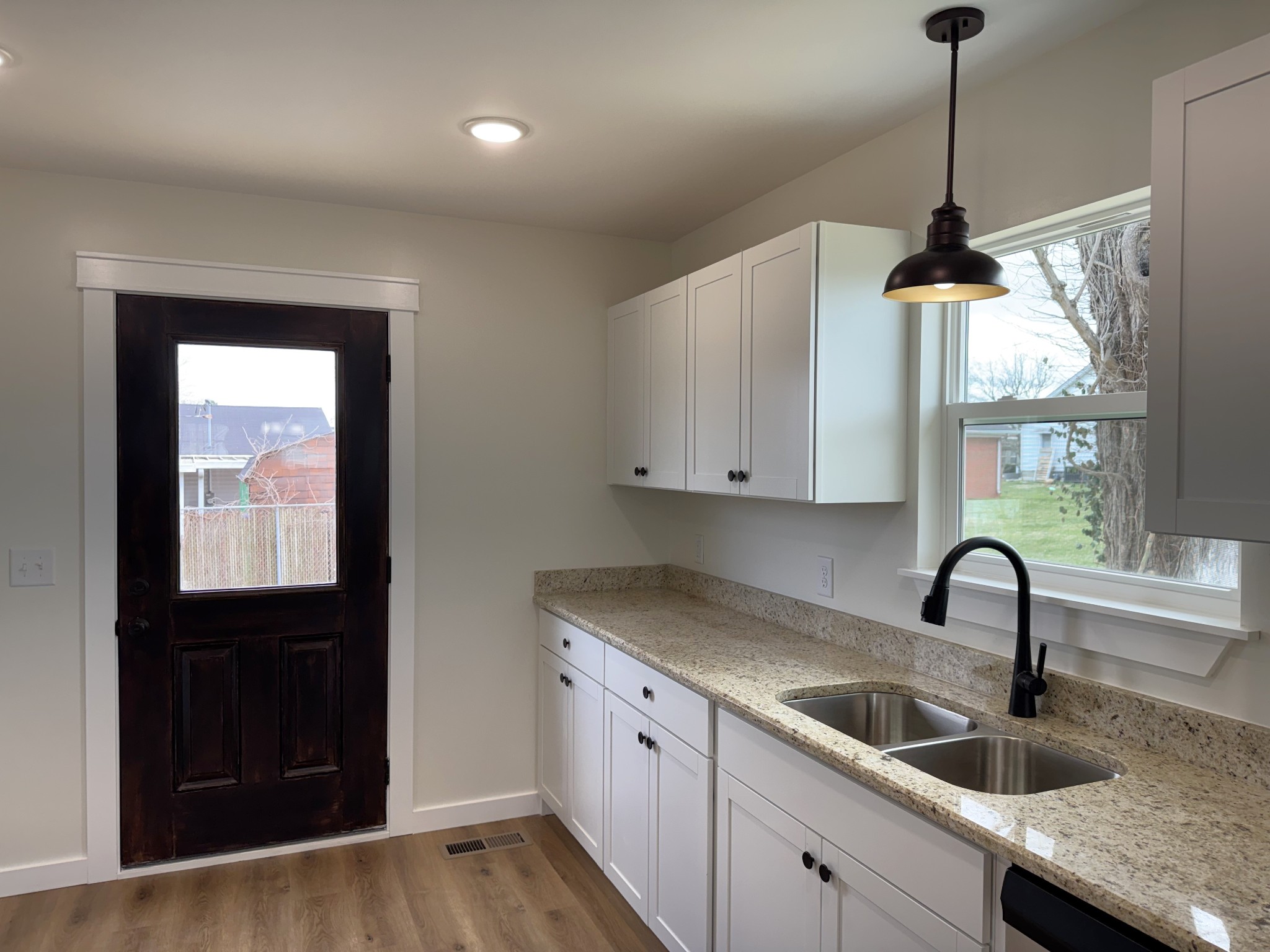 706 Courthouse View Street Lafayette, TN 37083 - Photo 14 of 27 a kitchen with sink and window