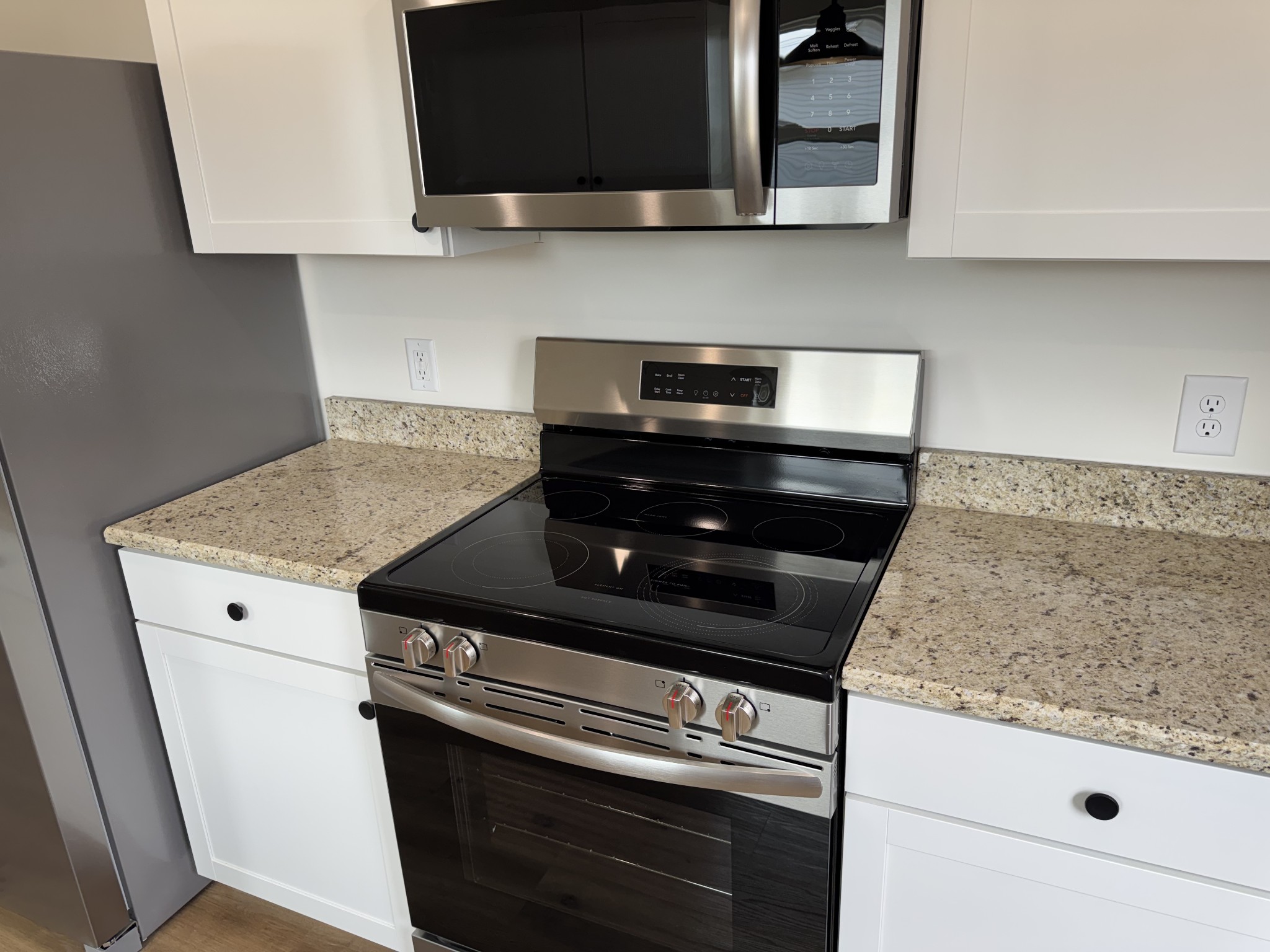 706 Courthouse View Street Lafayette, TN 37083 - Photo 16 of 27 a stove top oven sitting inside of a kitchen