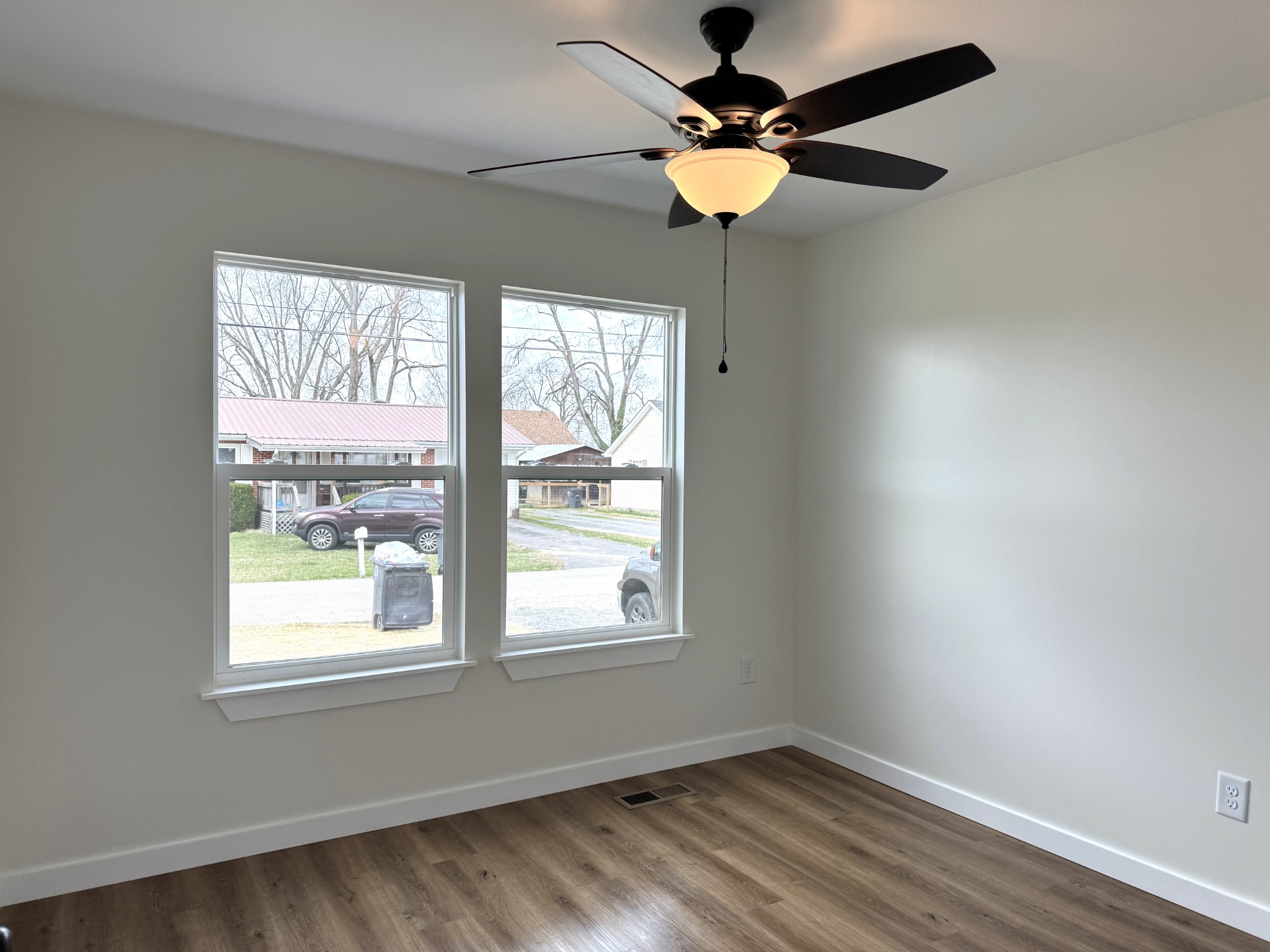 706 Courthouse View Street Lafayette, TN 37083 - Photo 19 of 27 an empty room with a window and a fan