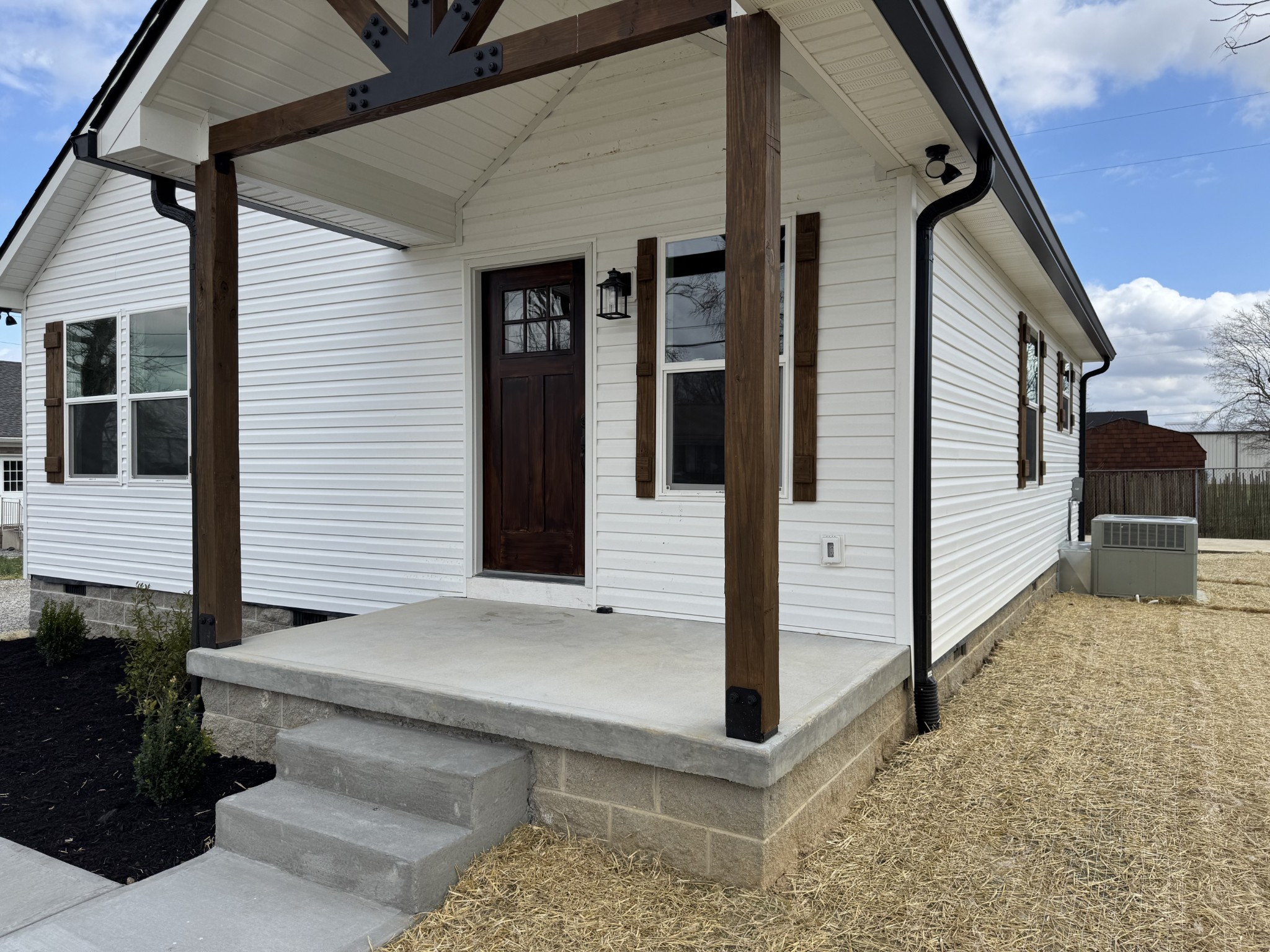 706 Courthouse View Street Lafayette, TN 37083 - Photo 24 of 27 a view of a porch with a table and chair