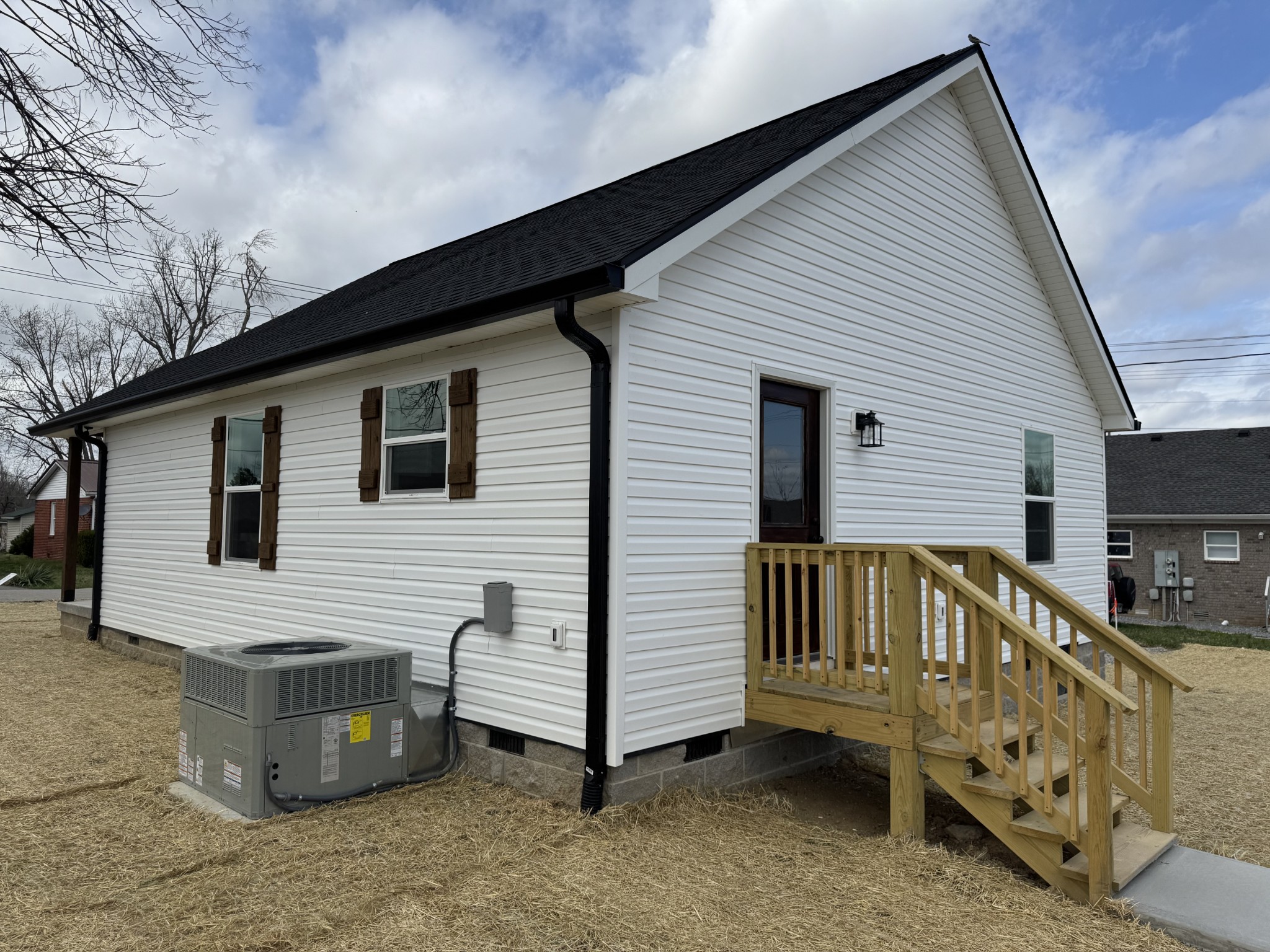 706 Courthouse View Street Lafayette, TN 37083 - Photo 25 of 27 a view of a house with a wooden fence
