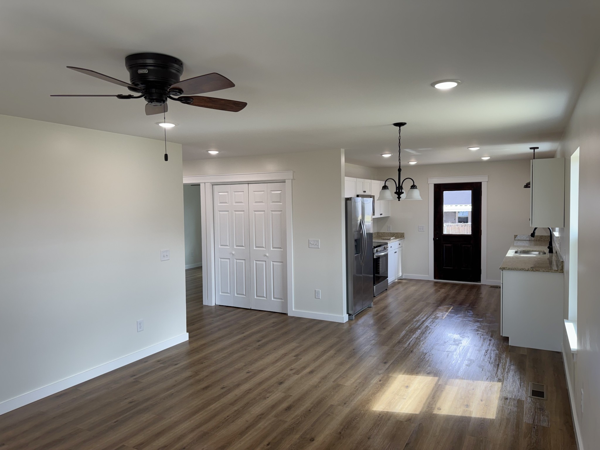 706 Courthouse View Street Lafayette, TN 37083 - Photo 6 of 27 a view of a kitchen and wooden floor