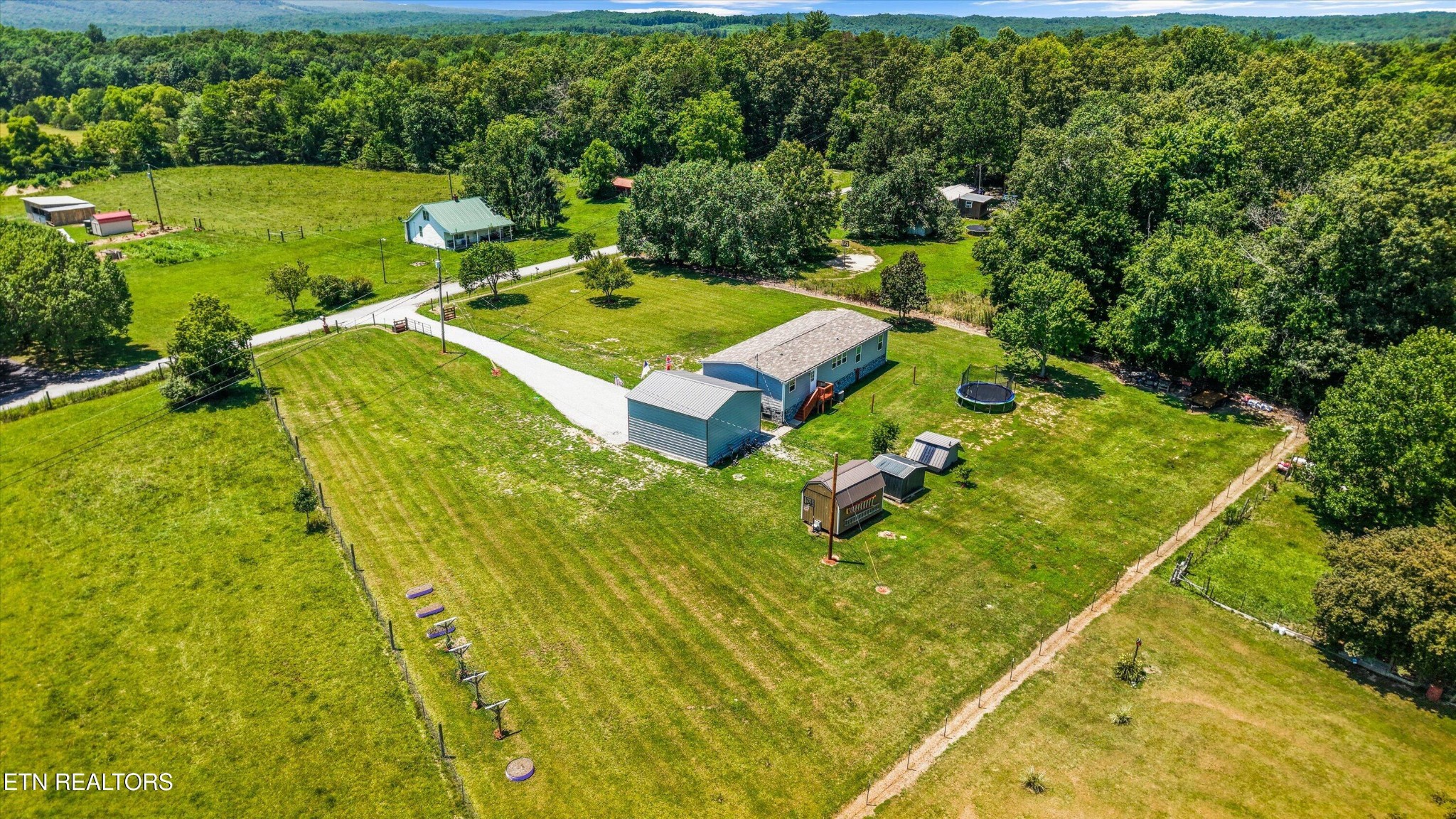 158 Frankfort Road Lancing, TN 37770 - Photo 43 of 46 a view of a yard with chairs