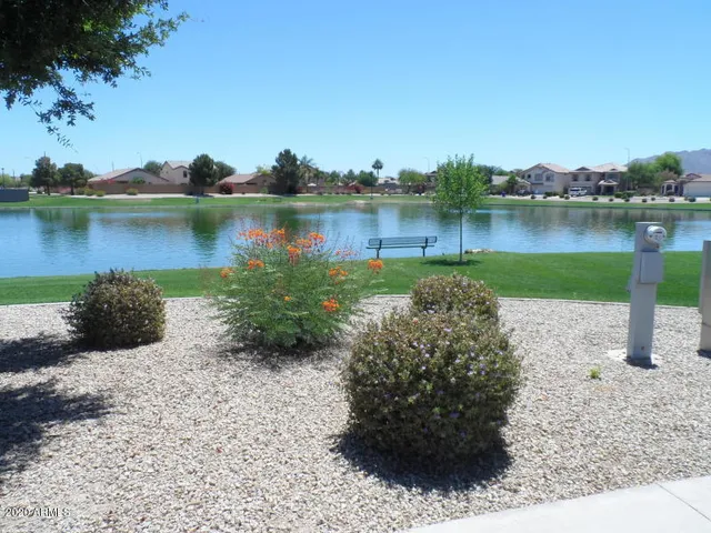 a view of a lake with a city view