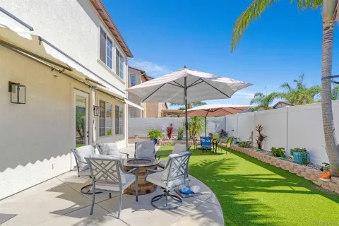 a view of yard with outdoor seating