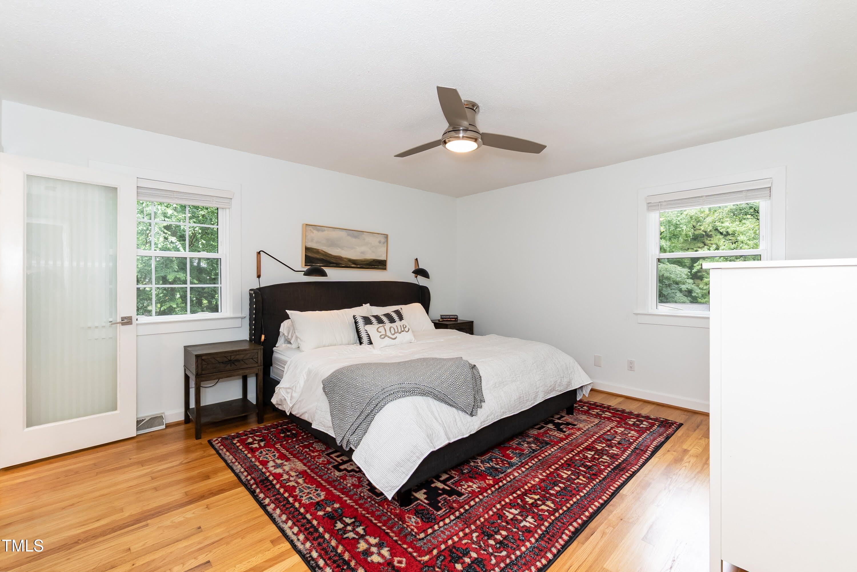 9024 Oneal Road Raleigh, NC 27613 - Photo 21 of 40 Hardwood floors, smooth ceilings and modern ceiling fan