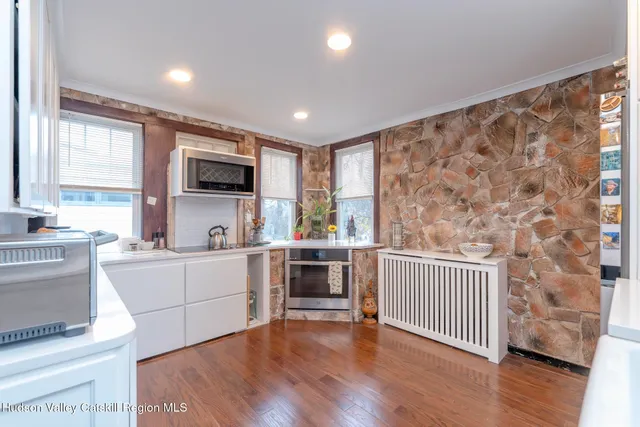 a view of livingroom with furniture and windows