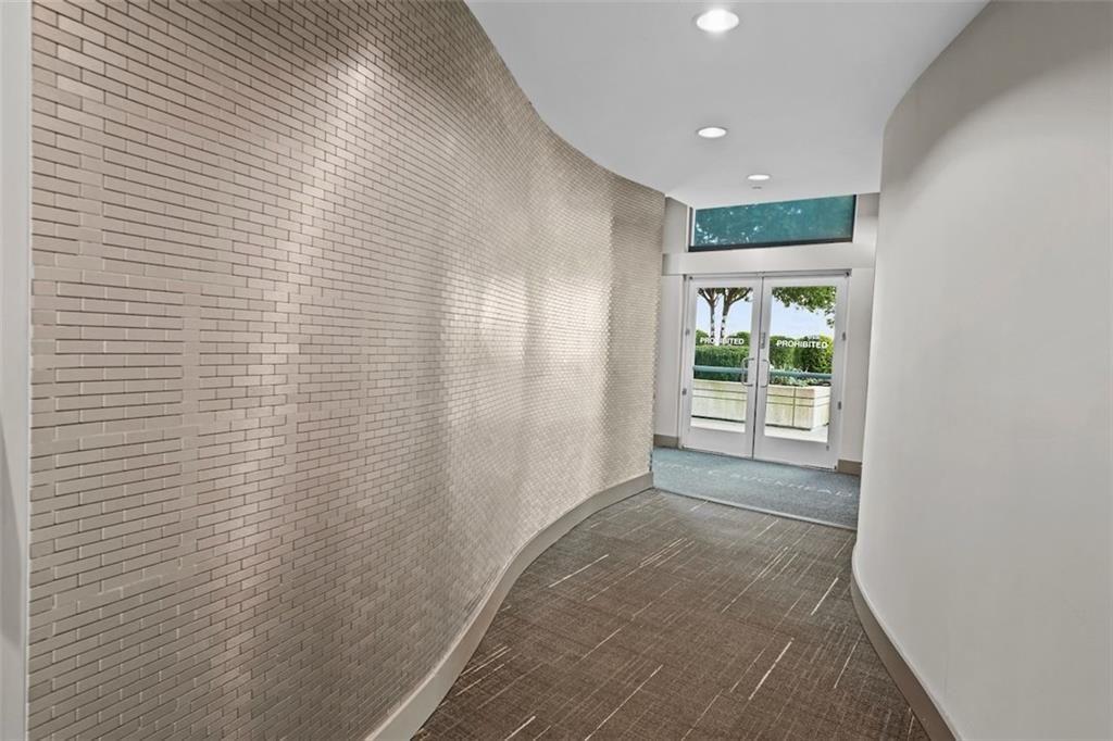 250 Pharr Road Northeast, Unit 602 Atlanta, GA 30305 - Photo 21 of 38 a view of an empty room