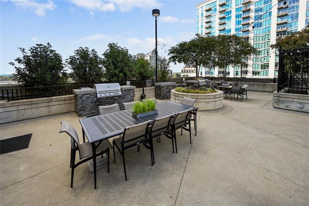 250 Pharr Road Northeast, Unit 602 Atlanta, GA 30305 - Photo 27 of 38 a view of outdoor space with seating area