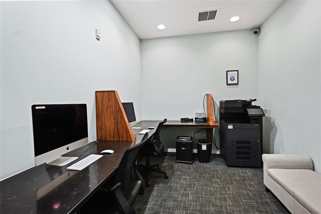 250 Pharr Road Northeast, Unit 602 Atlanta, GA 30305 - Photo 30 of 38 a view of a workspace with furniture